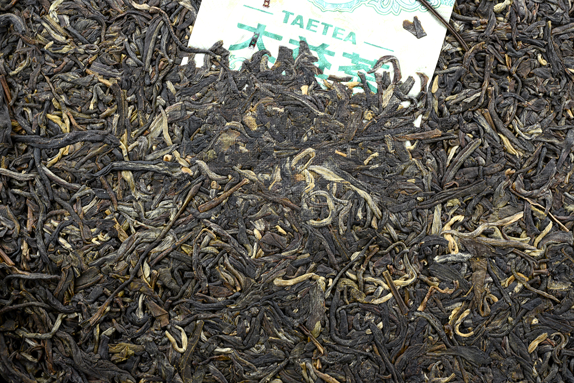 2013 Menghai 7742 sheng puerh tea