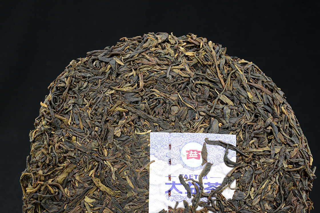2014 Menghai Dayi pávazöld prémium sheng puerh tea