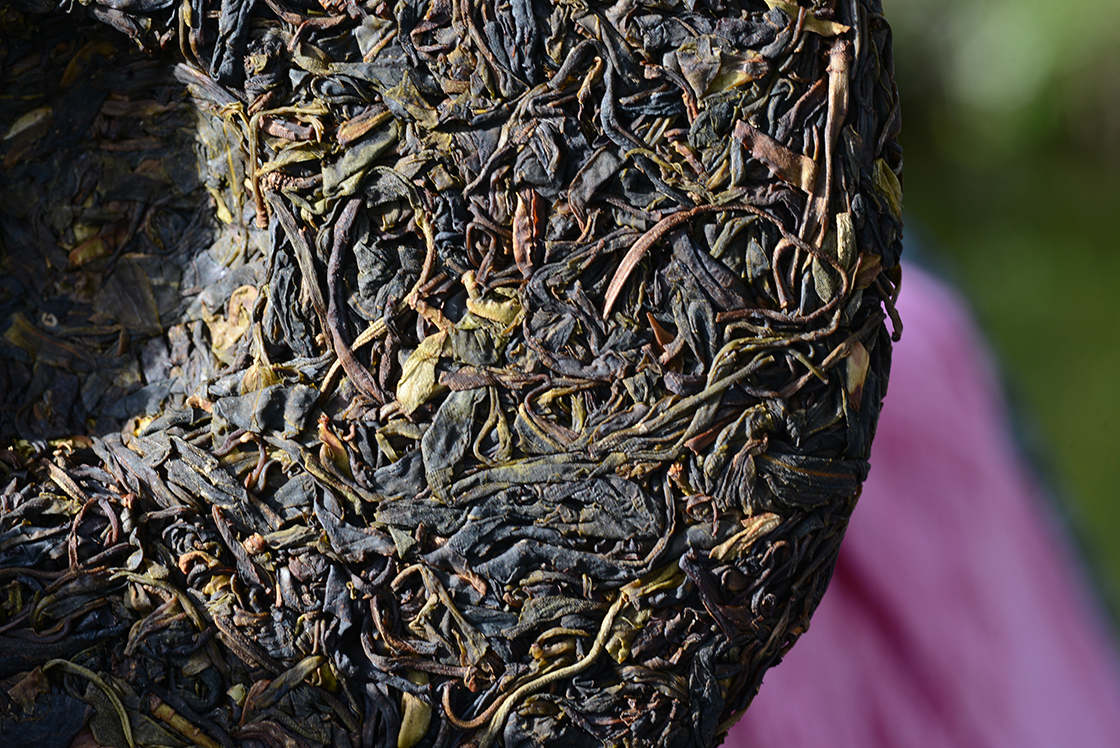 2014 Dehong Ye sheng cha vad bíbor sheng puerh tea