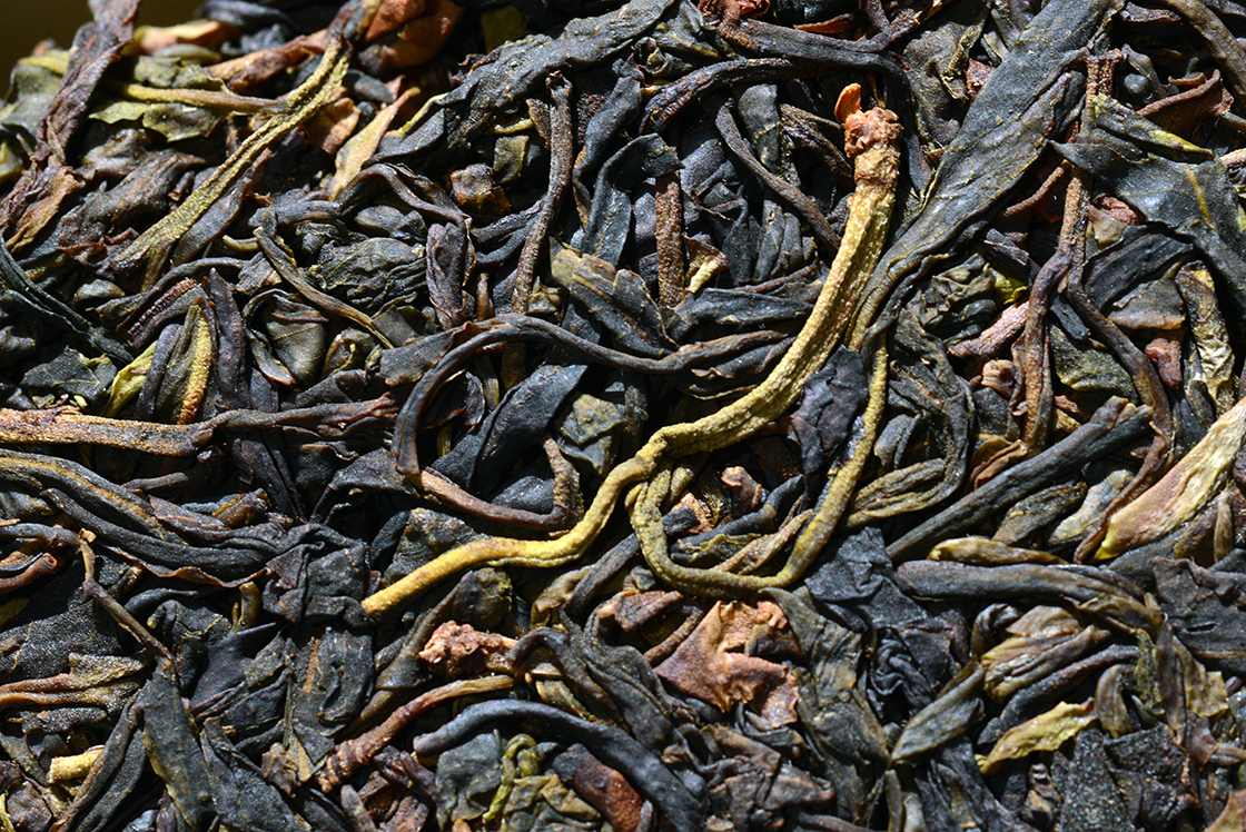 2014 Dehong Ye sheng cha vad bíbor sheng puerh tea